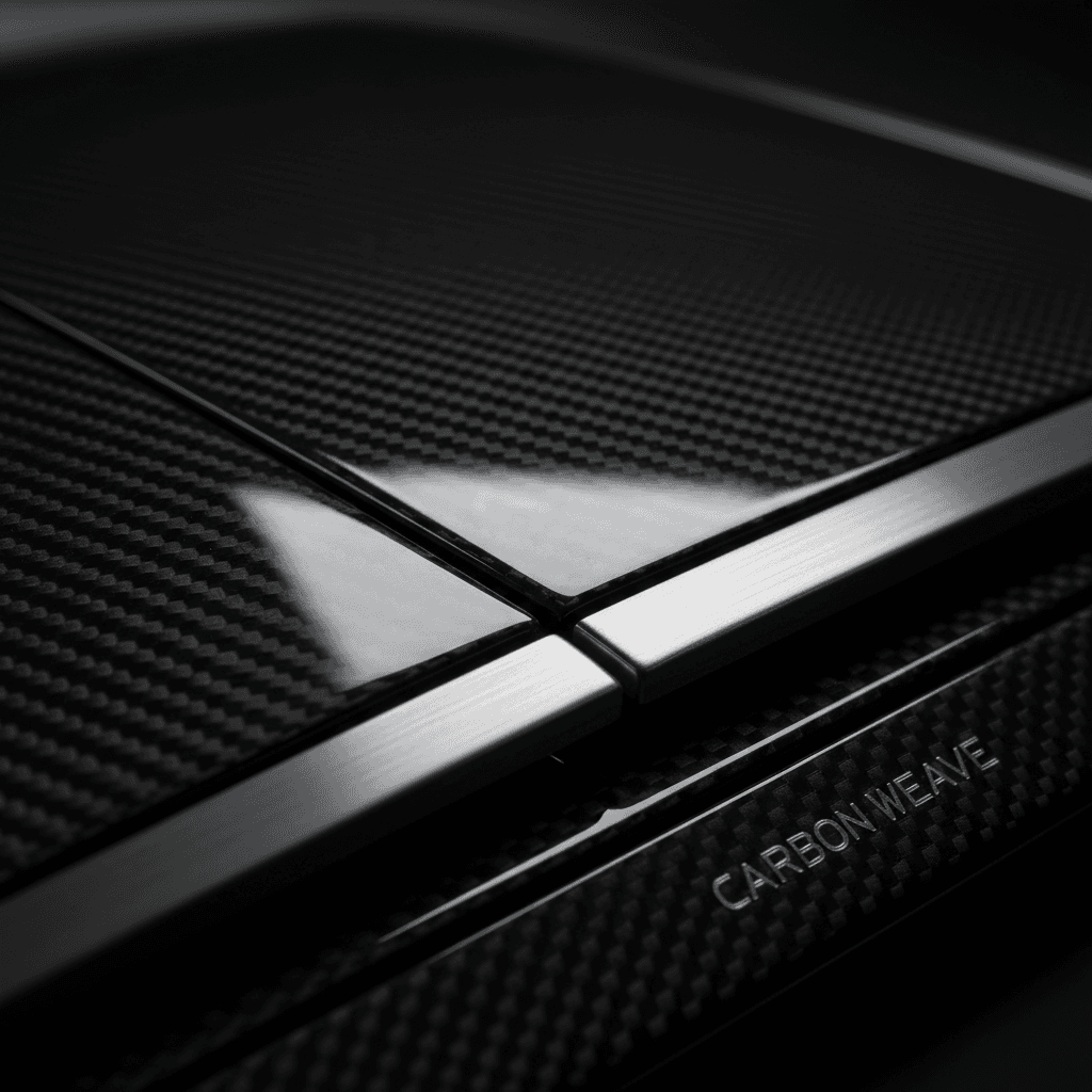Precision-machined carbon fiber composite panel close-up